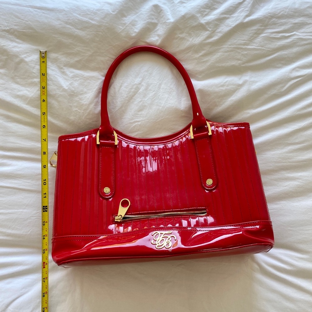 Ted Baker red expandable tote with gold hardware